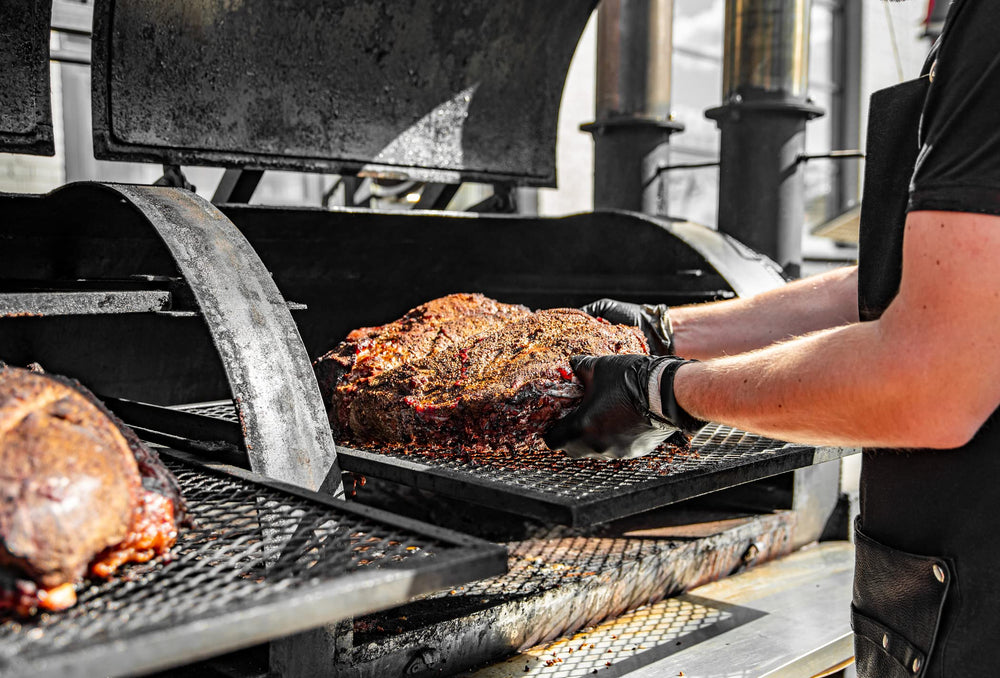 Nechtik lifestyle backyard barbecue scene showing professional-looking food service