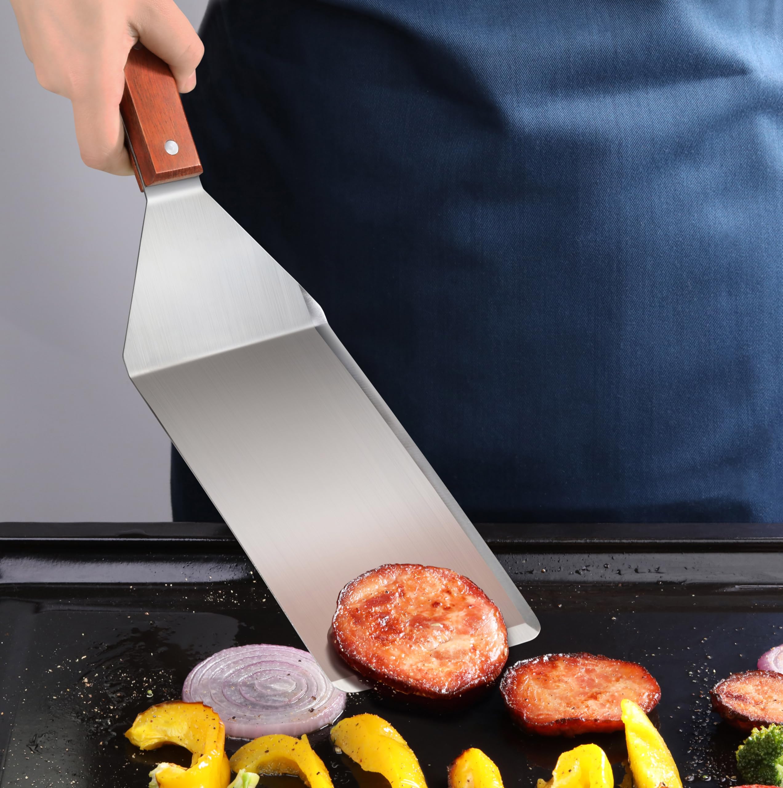 New Star Foodservice serving burger with turner for safer transfer benefit