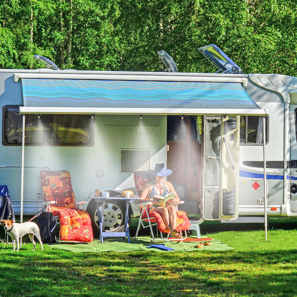 NFAMRZCAR nozzles installed on an RV awning delivering cooling mist for outdoor comfort