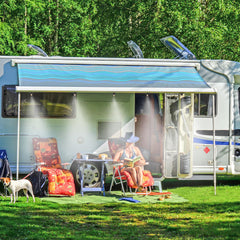 NFAMRZCAR nozzles installed on an RV awning delivering cooling mist for outdoor comfort
