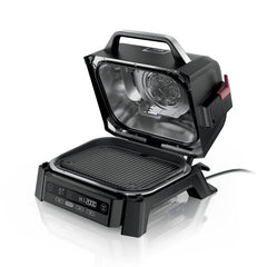Ninja woodfire front view showing compact outdoor grill and smoker, ideal for patios