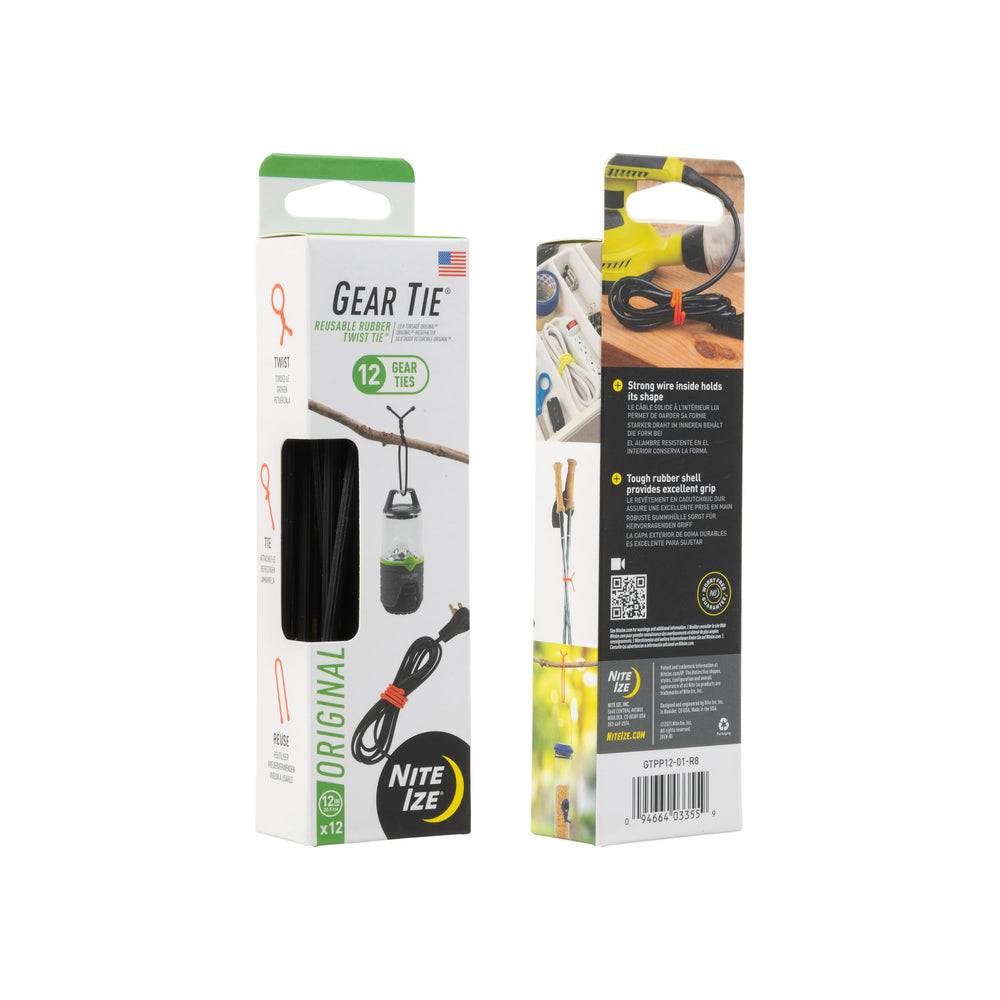 Hand twisting a Nite Ize Gear Tie to secure cords demonstrating easy fastening