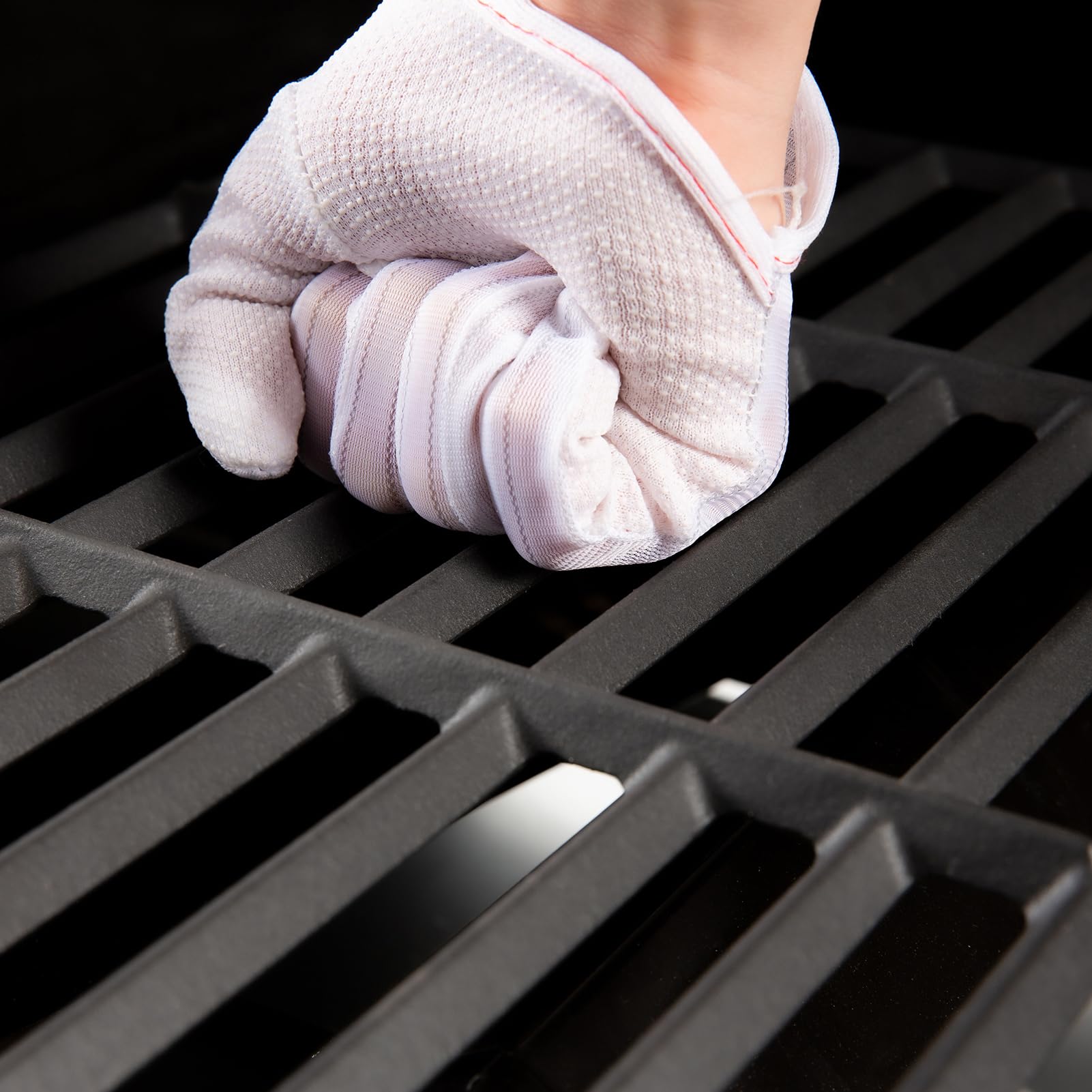 Oklagarden grates being oiled for seasoning and long-lasting protection