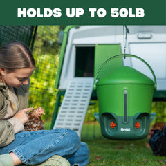 Omlet hanger suspending feeder inside coop, keeps feed cleaner longer