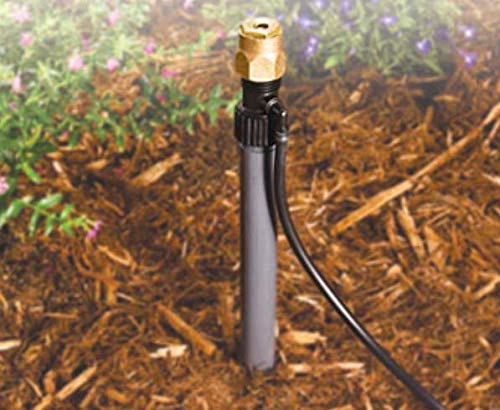 One Stop Outdoor close-up of 1/4 inch barbed outlet demonstrating secure drip tubing connection and leak resistance