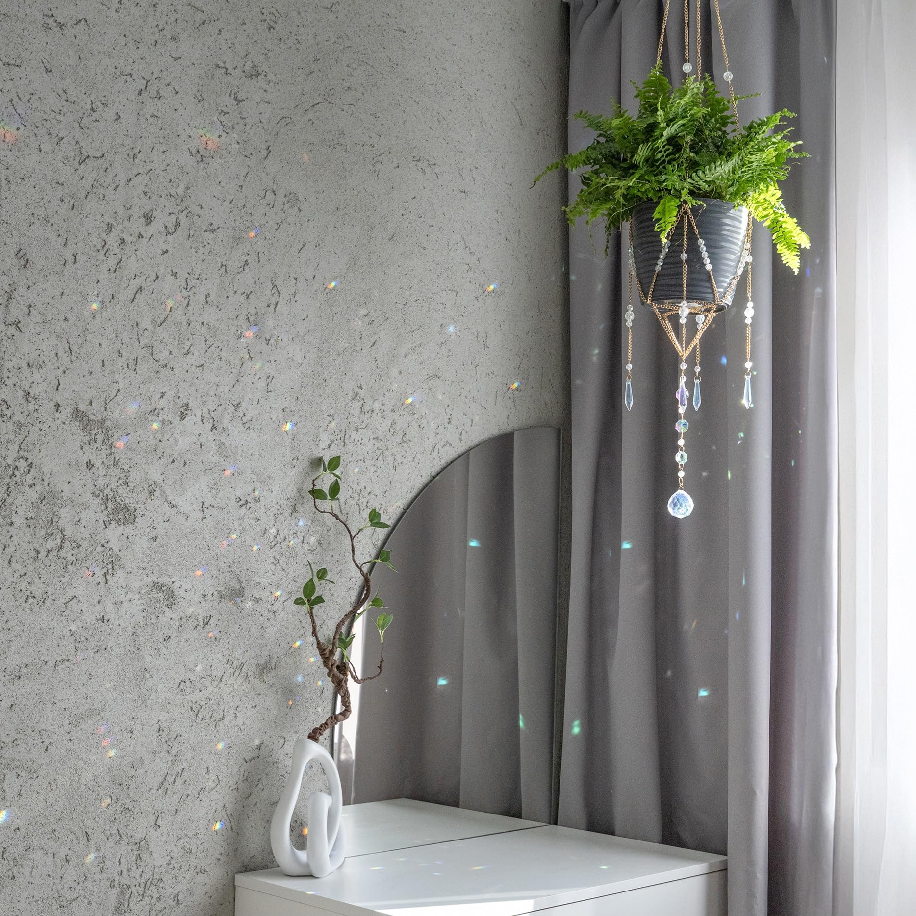 ORCHID AURA hanger held by hands to show size and scale