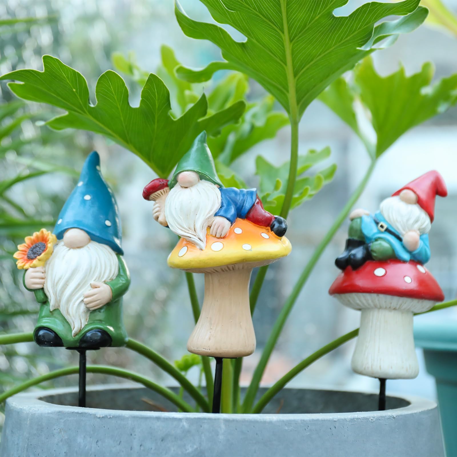 Ovewios gnome planted in a flower pot showing easy stake installation