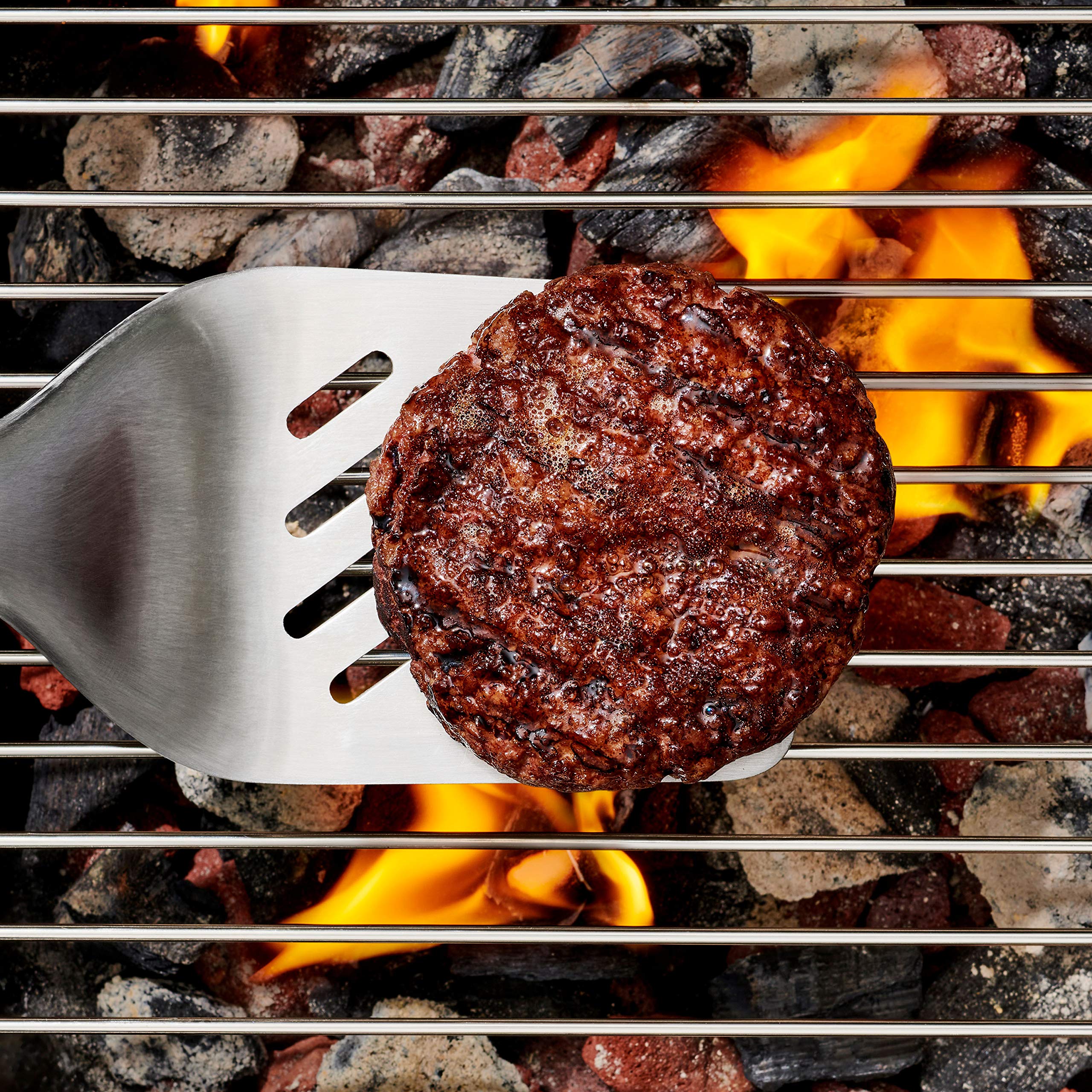 OXO turner in use flipping burger showing precise control benefit