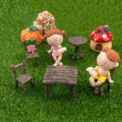 PIVNASY table and chair placed inside terrarium adding charm