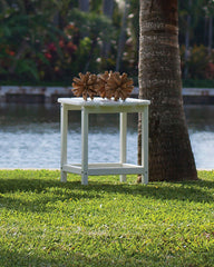 POLYWOOD South Beach in use beside Adirondack chair showing convenient drink placement
