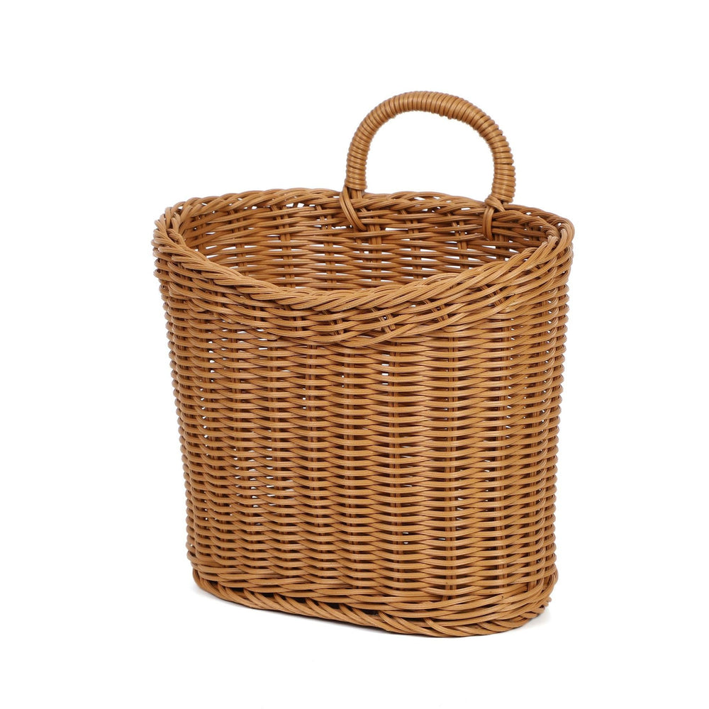 Quincry cluster of baskets on cafe wall creating layered decorative impact