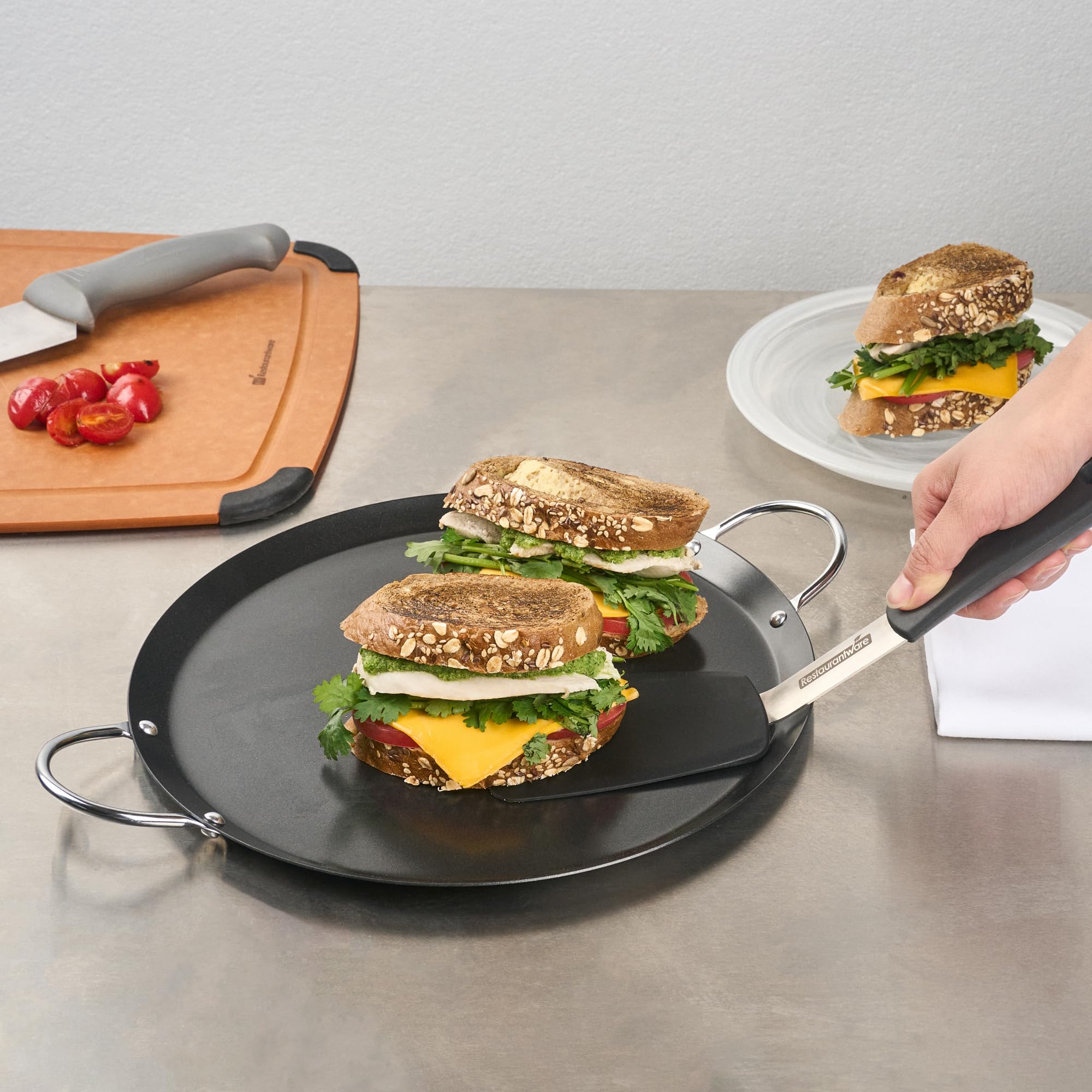Restaurantware comal in use with a tortilla highlighting even heat and perfect searing