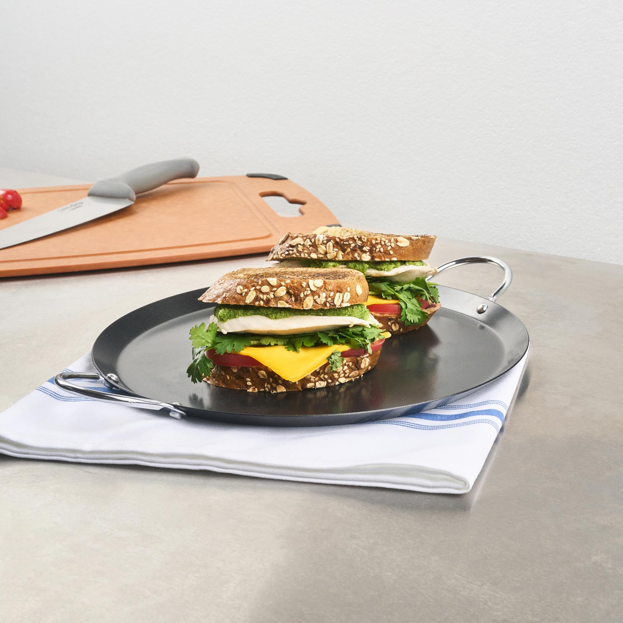 Restaurantware comal heating on stovetop demonstrating fast heat response and consistency