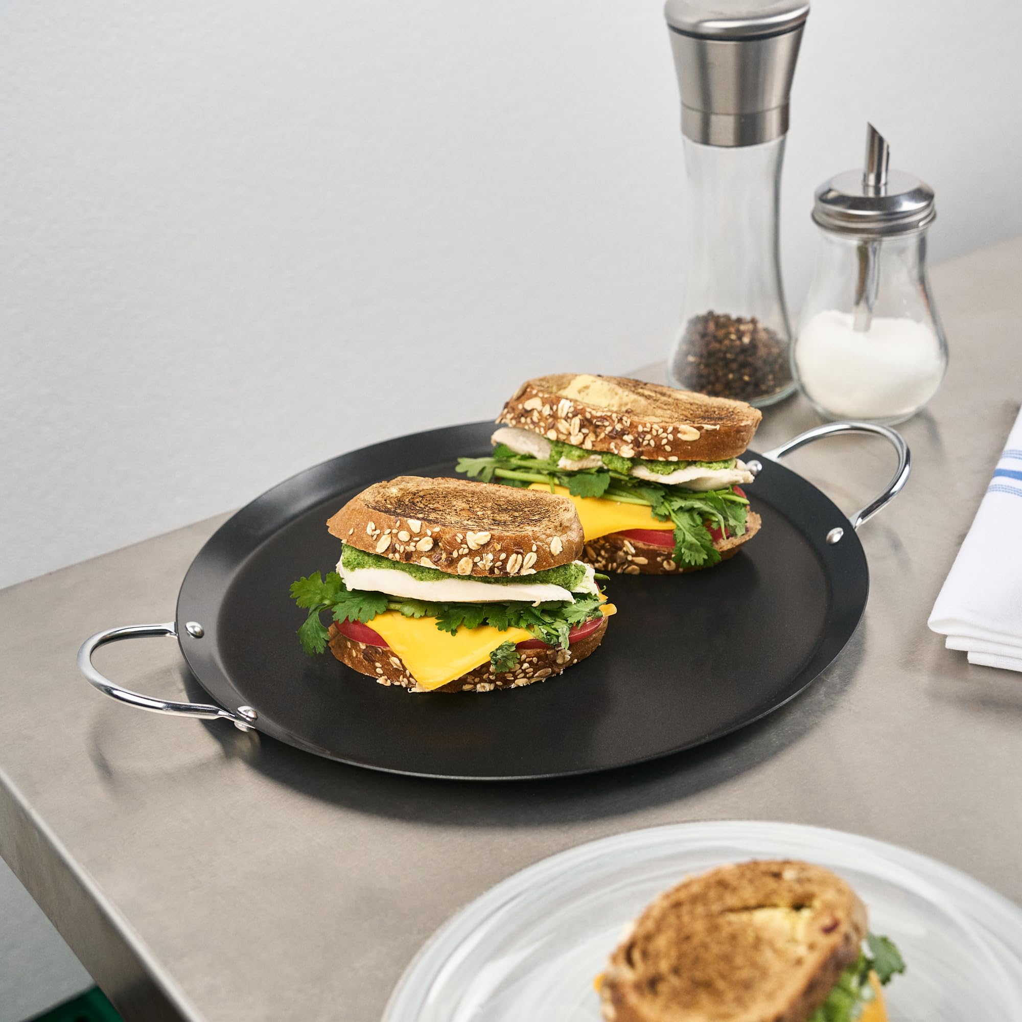 Restaurantware close texture and edge detail illustrating durable carbon steel construction