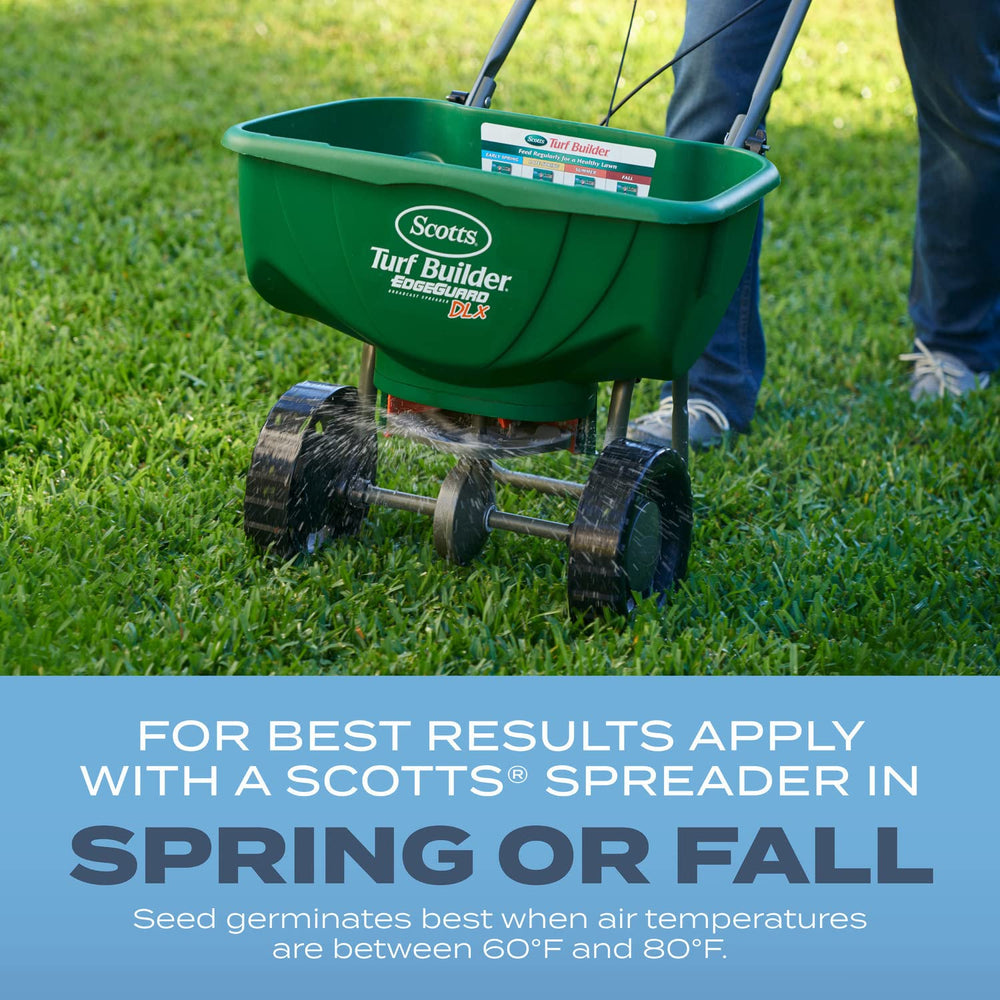 Scotts spreader distributing seed evenly for uniform lawn establishment