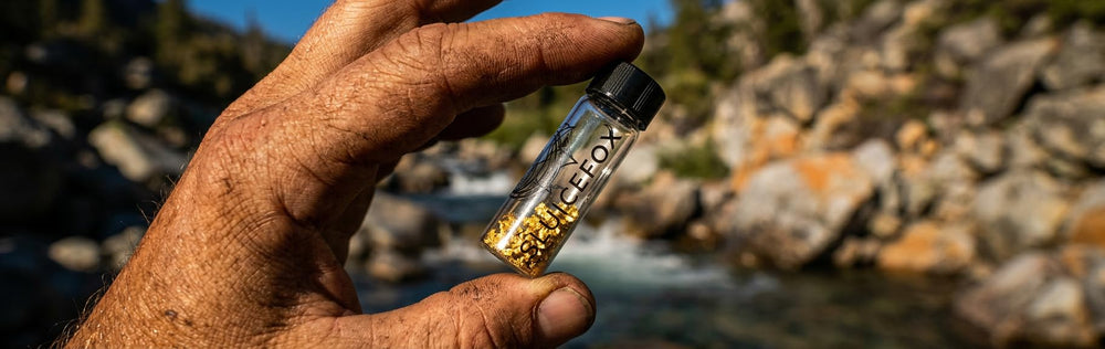 Sluice Fox small gold flakes in vials ready for secure storage and documentation