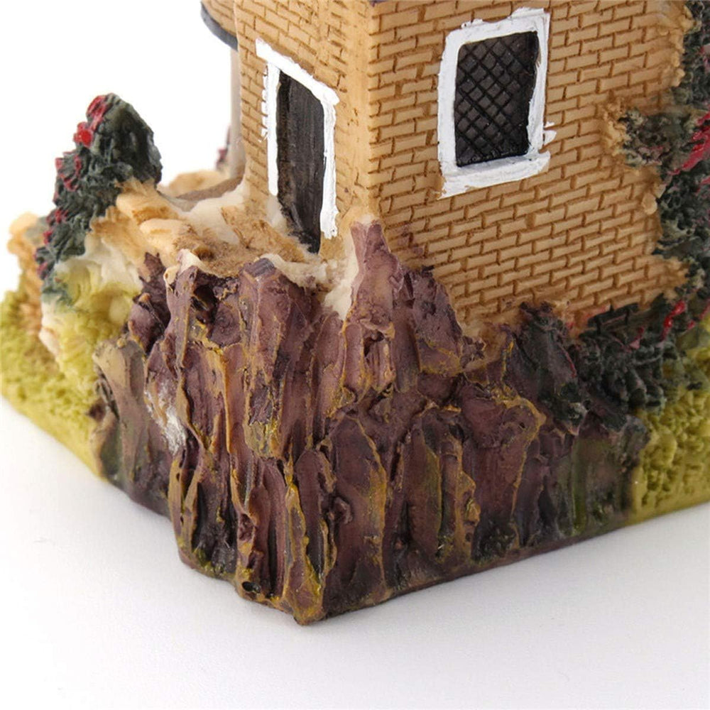 Smowfes fairy houses staged in a garden pot to display enchanting styling and outdoor décor benefit