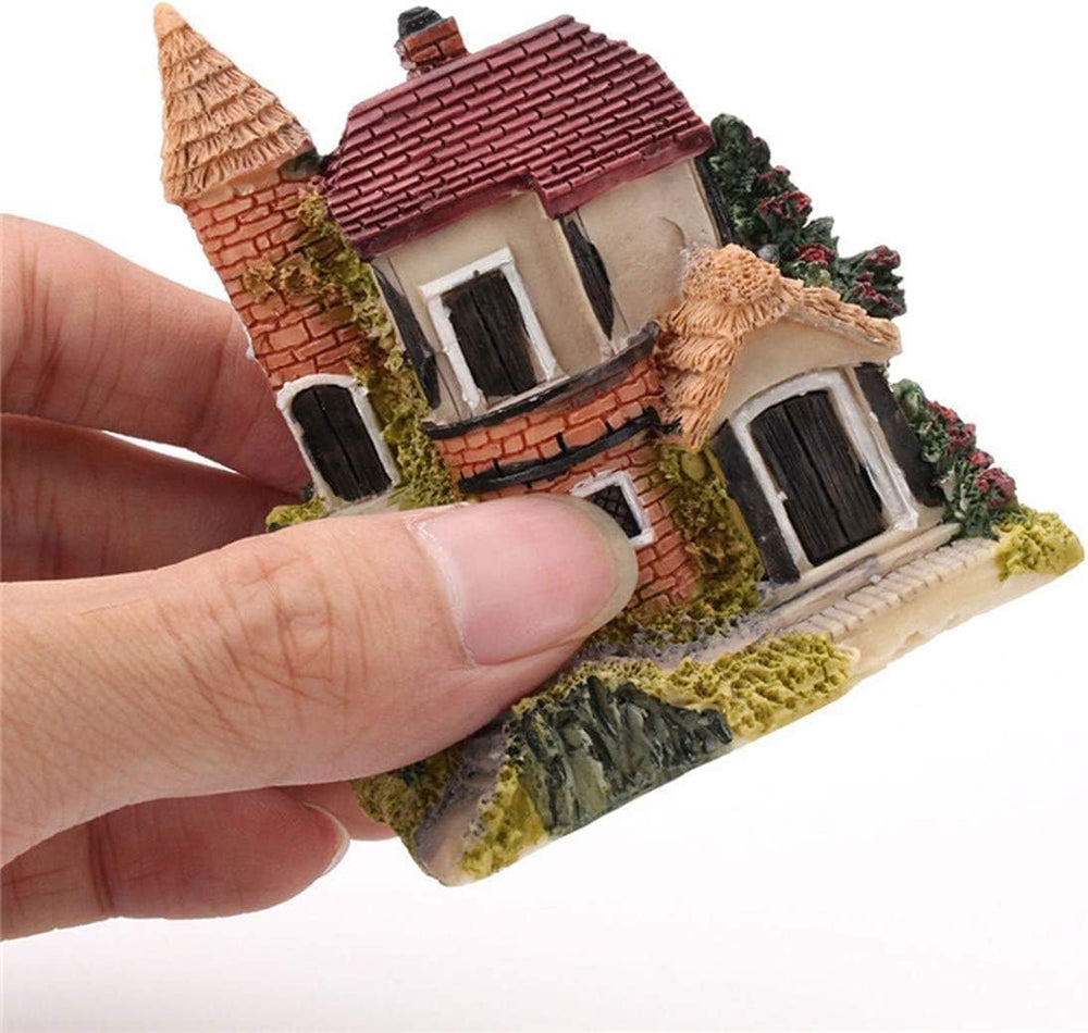 Smowfes houses next to a ruler for size comparison demonstrating compact, display-friendly dimensions