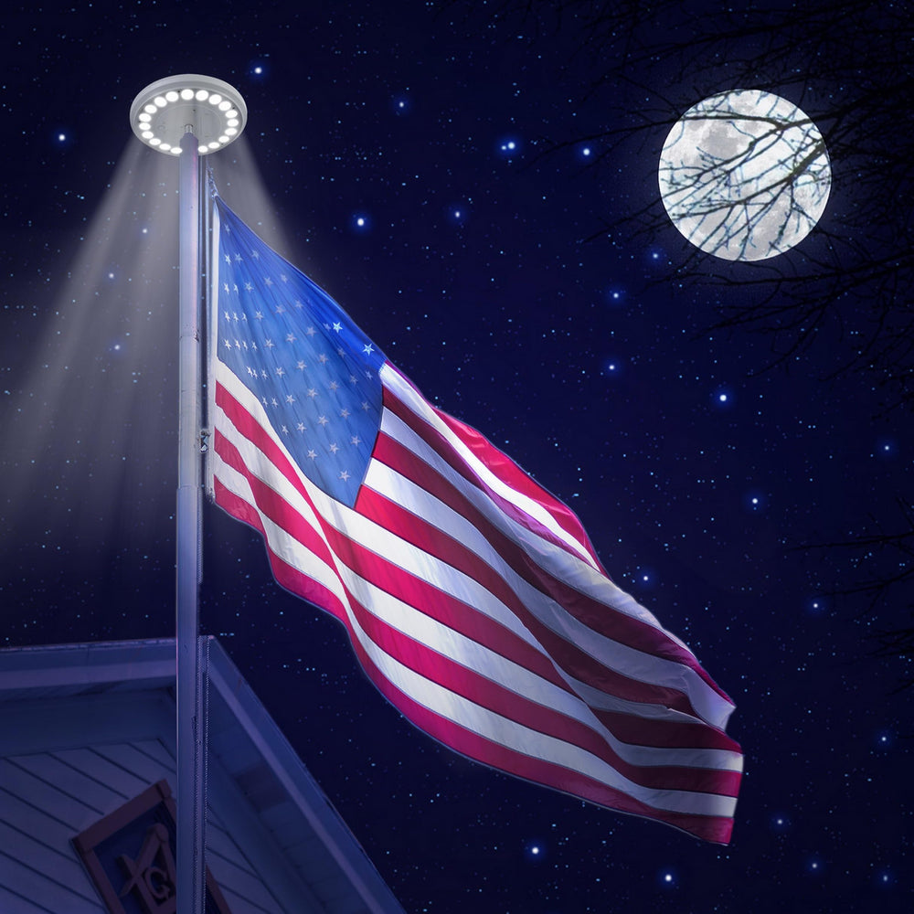 Sunnytech installed at night illuminating flag, improves visibility benefit
