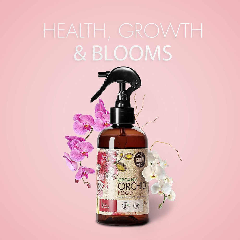 The Grow Co bottle on a shelf with blooming orchids for vibrant blooms