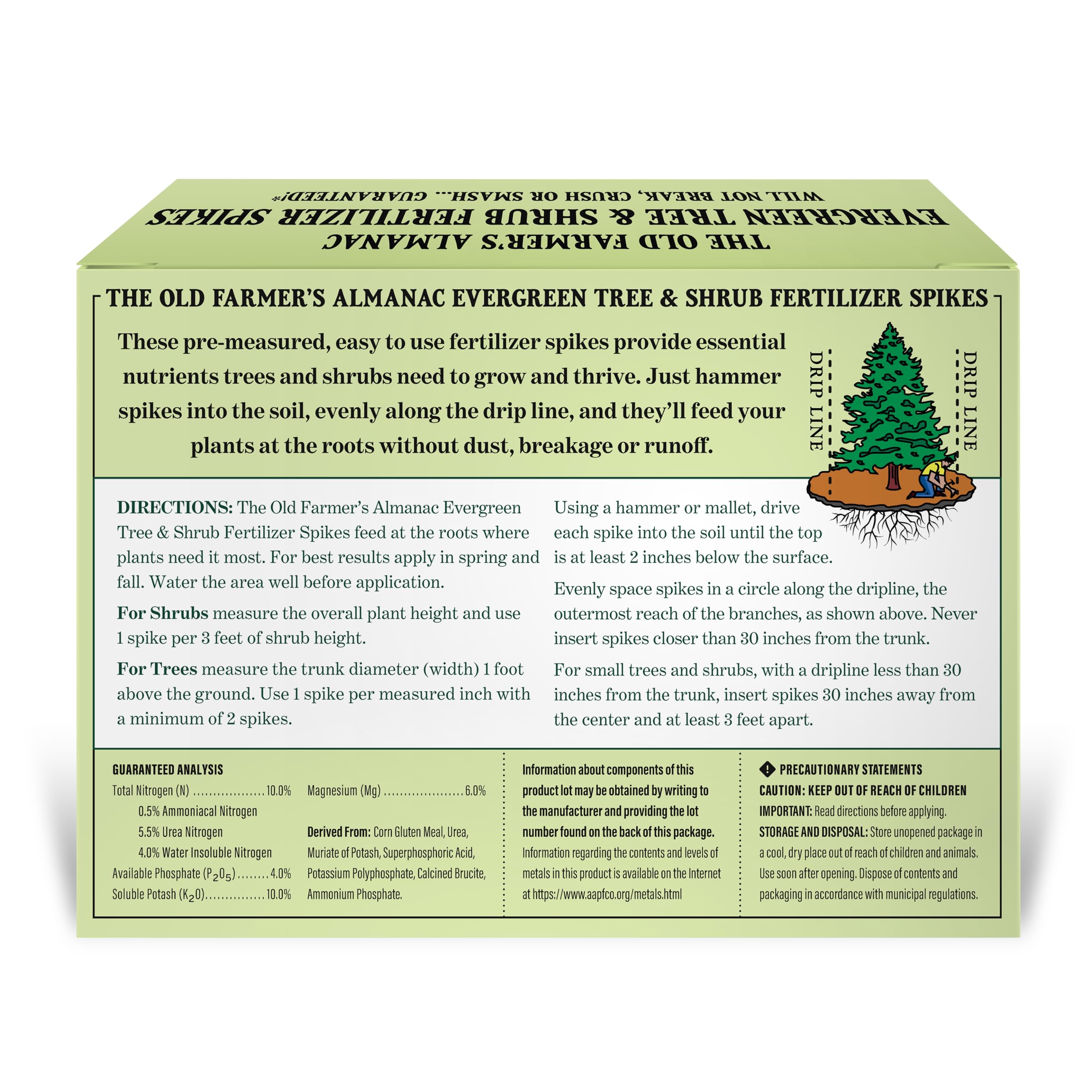 Landscape scene with evergreens treated by The Old Farmer's Almanac spikes boosting foliage color