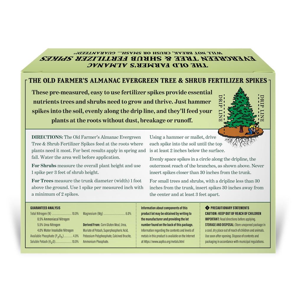 Landscape scene with evergreens treated by The Old Farmer's Almanac spikes boosting foliage color