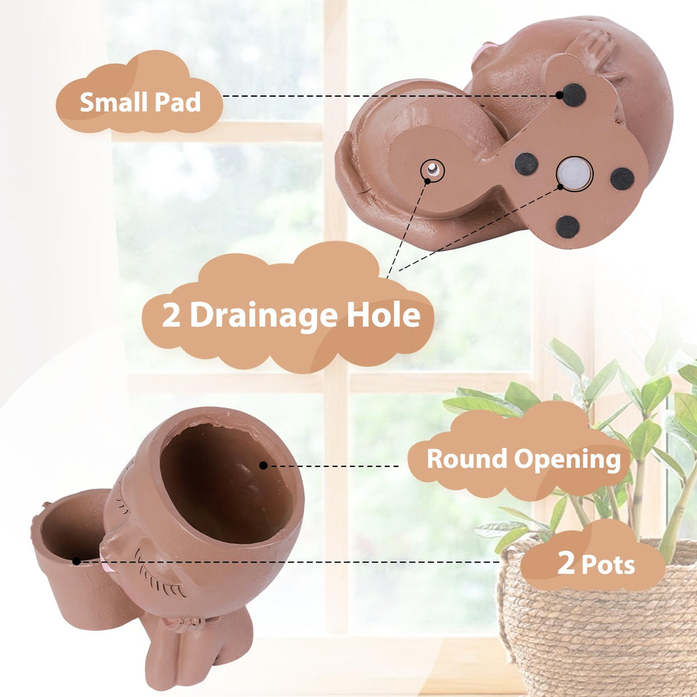 vomiceak base view highlighting two drainage holes and two plugs for watering control