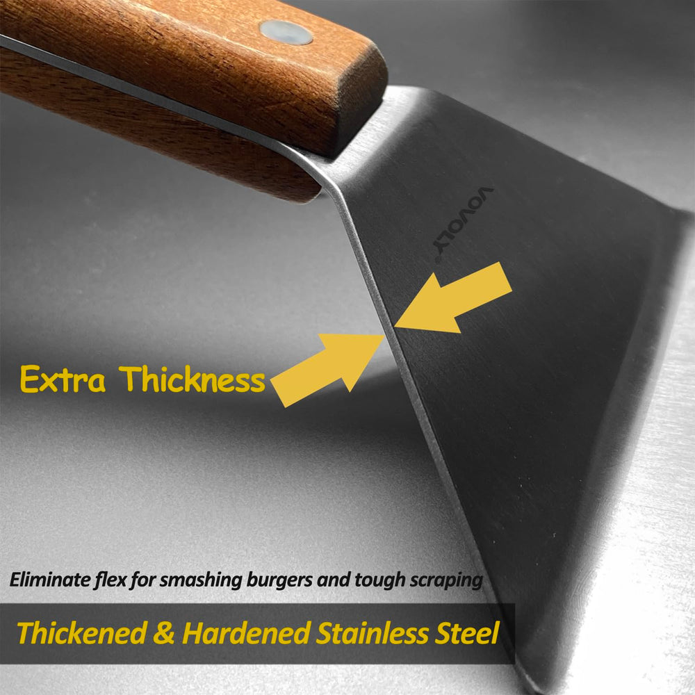 Vovoly spatula lifting pancake on griddle showcasing wide surface for secure flips and even handling
