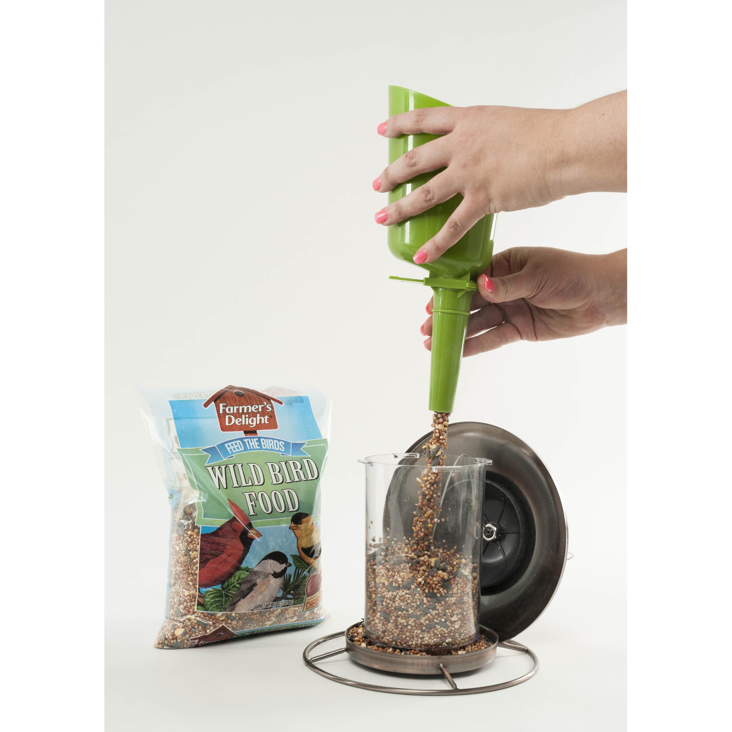 Wagner's ground-feeding birds eating cracked corn and milo from the mix