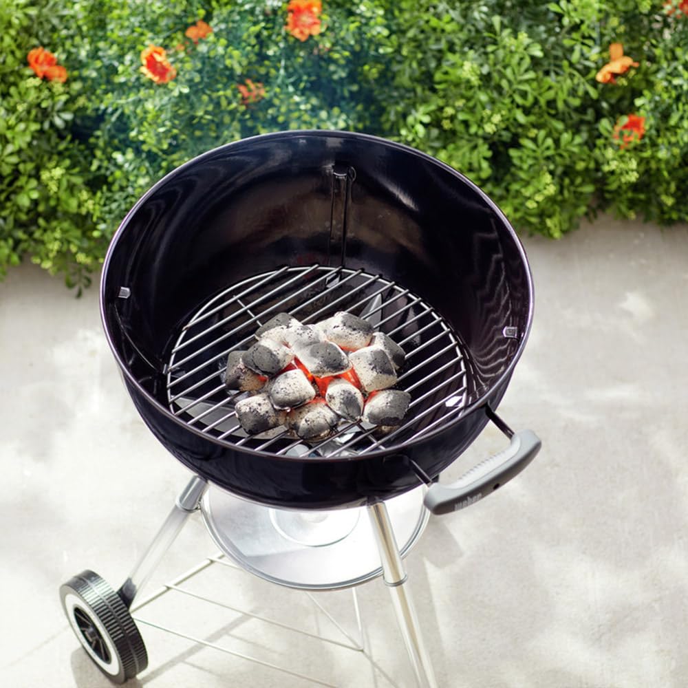 Weber® charcoal cooking grate installed in 18-inch kettle improving airflow