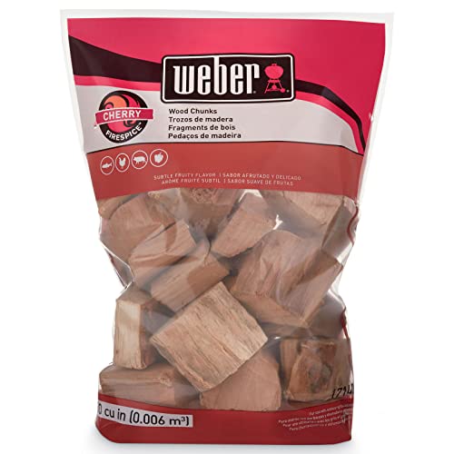 Weber cherry wood chunks next to ruler showing chunk size and burn control benefit