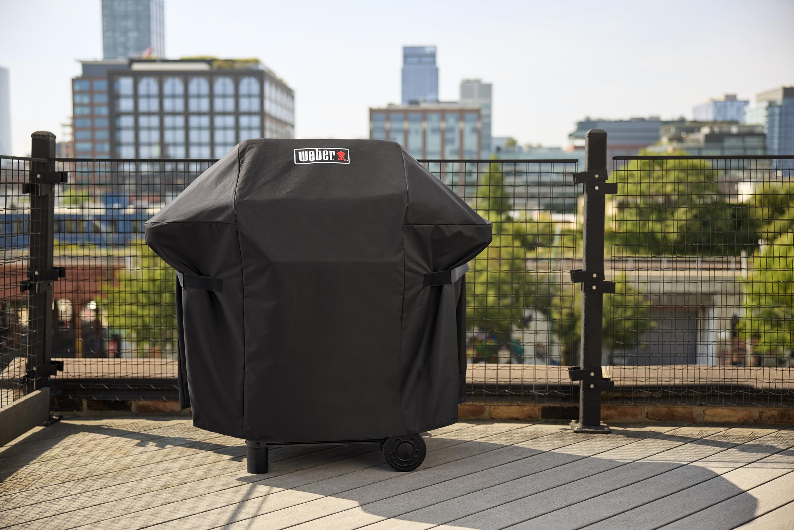 Weber cover shedding rain demonstrating weather protection benefits