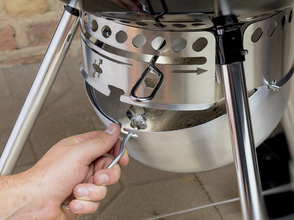 Weber glass-reinforced nylon handle shown for comfortable, heat-resistant handling