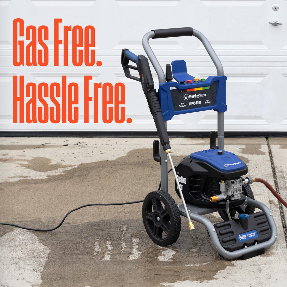 Westinghouse pressure washer cleaning driveway for fast stain removal