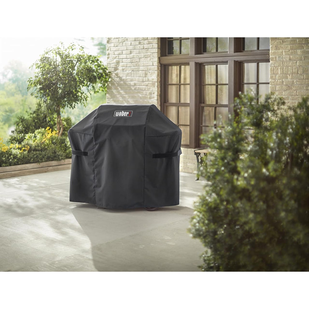 WOBER COVER on grill in backyard setting protects from weather and dust