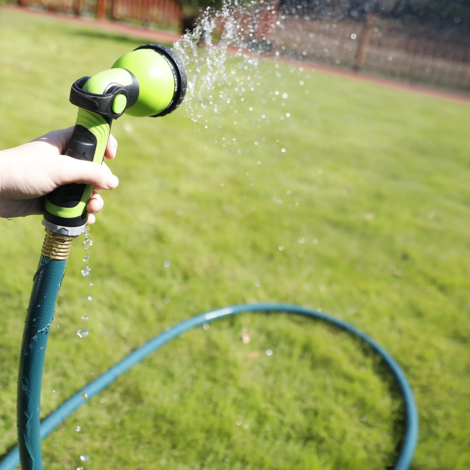 Worth hose cleaning patio and car showing all-weather reliability
