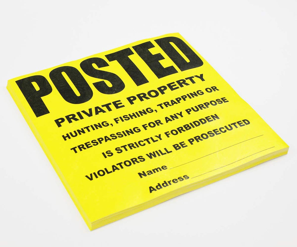 WristCo sign cable-tied to fence post showing secure-mounting benefit