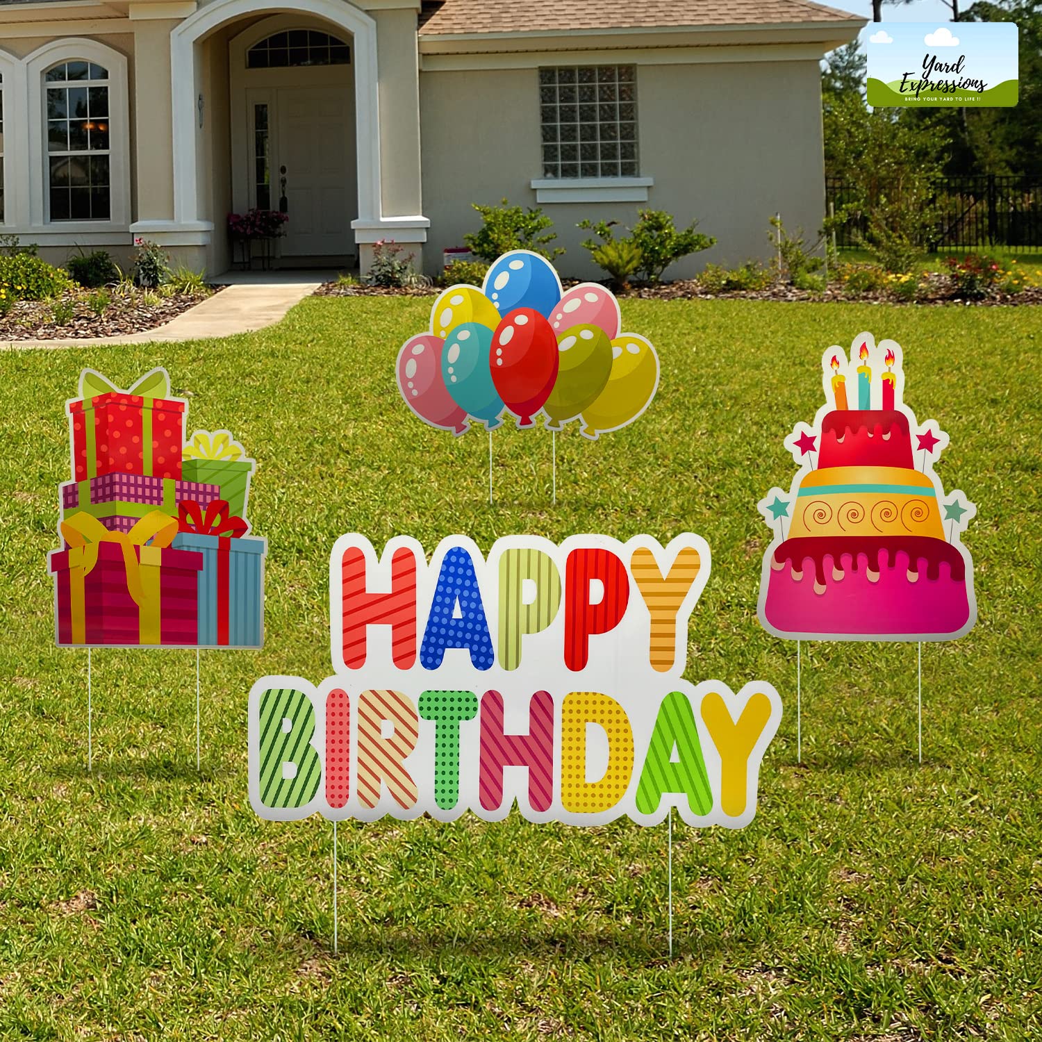 Generic yard expressions front view showing four colorful signs and stakes, clear celebration appeal