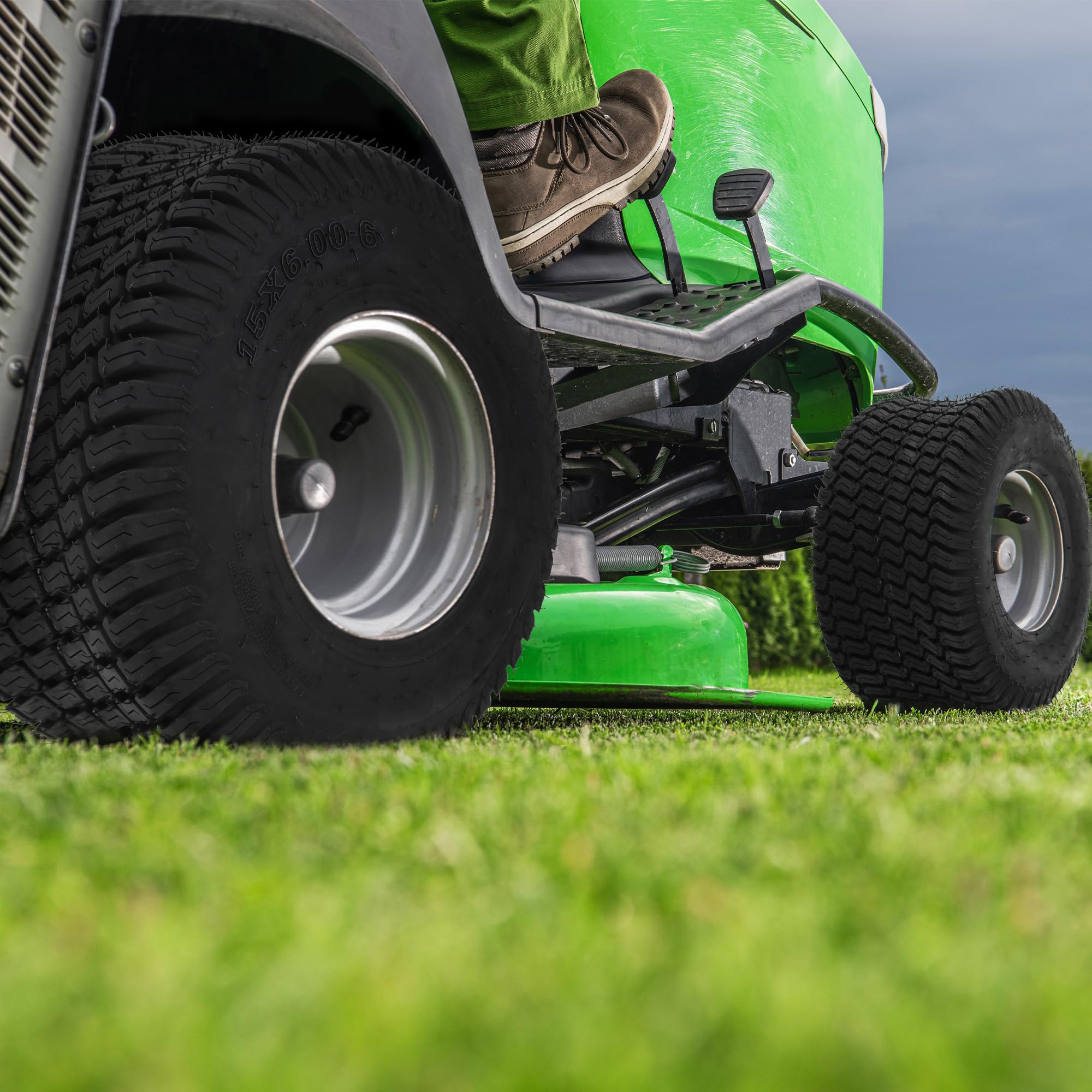 YITAMOTOR on mower in yard demonstrating low-turf-impact benefit