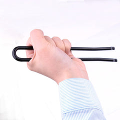 Ypzxola setter in use compressing a body-grip trap for safer installation