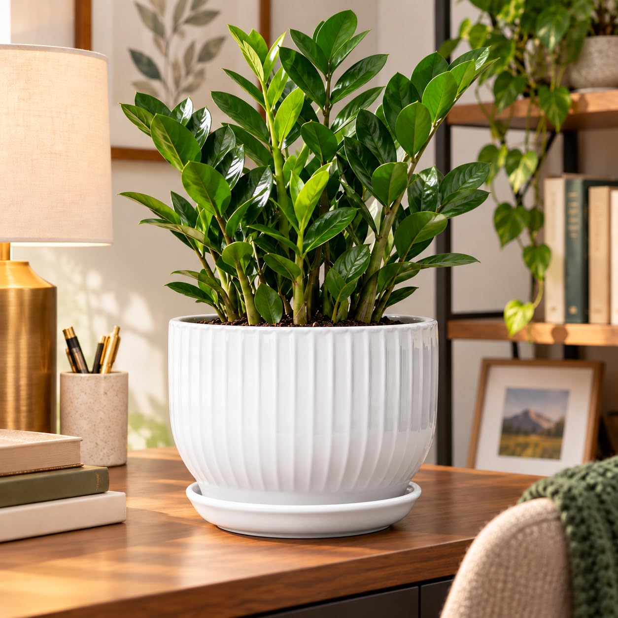 YUFDA pot held by hand showing 8-inch scale for sizing clarity